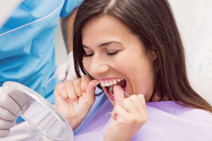 The Role of Flossing in Maintaining Dental Health